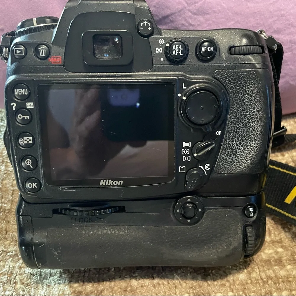 Nikon D300 DSLR camera body with MB-D10 battery grip